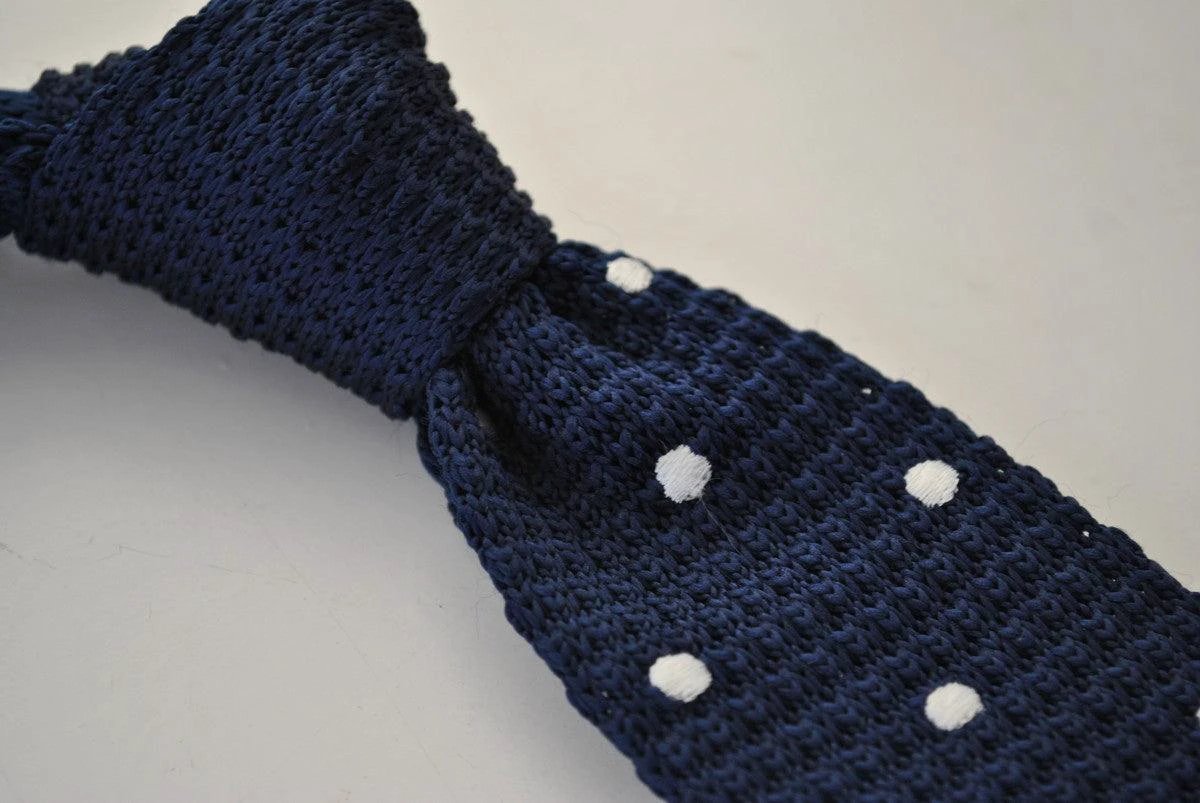 navy blue skinny knitted tie with white polka dots by Frederick Thomas Handmade Mens Ties