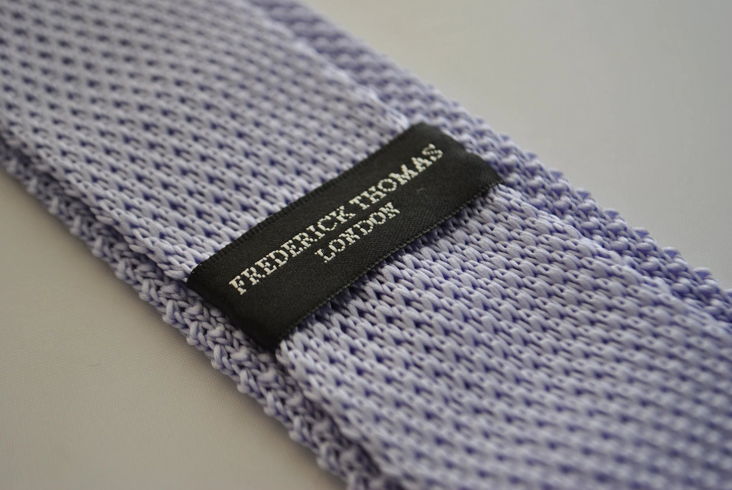 lavender purple skinny knitted tie with white polka dots by Frederick Thomas Handmade Mens Ties