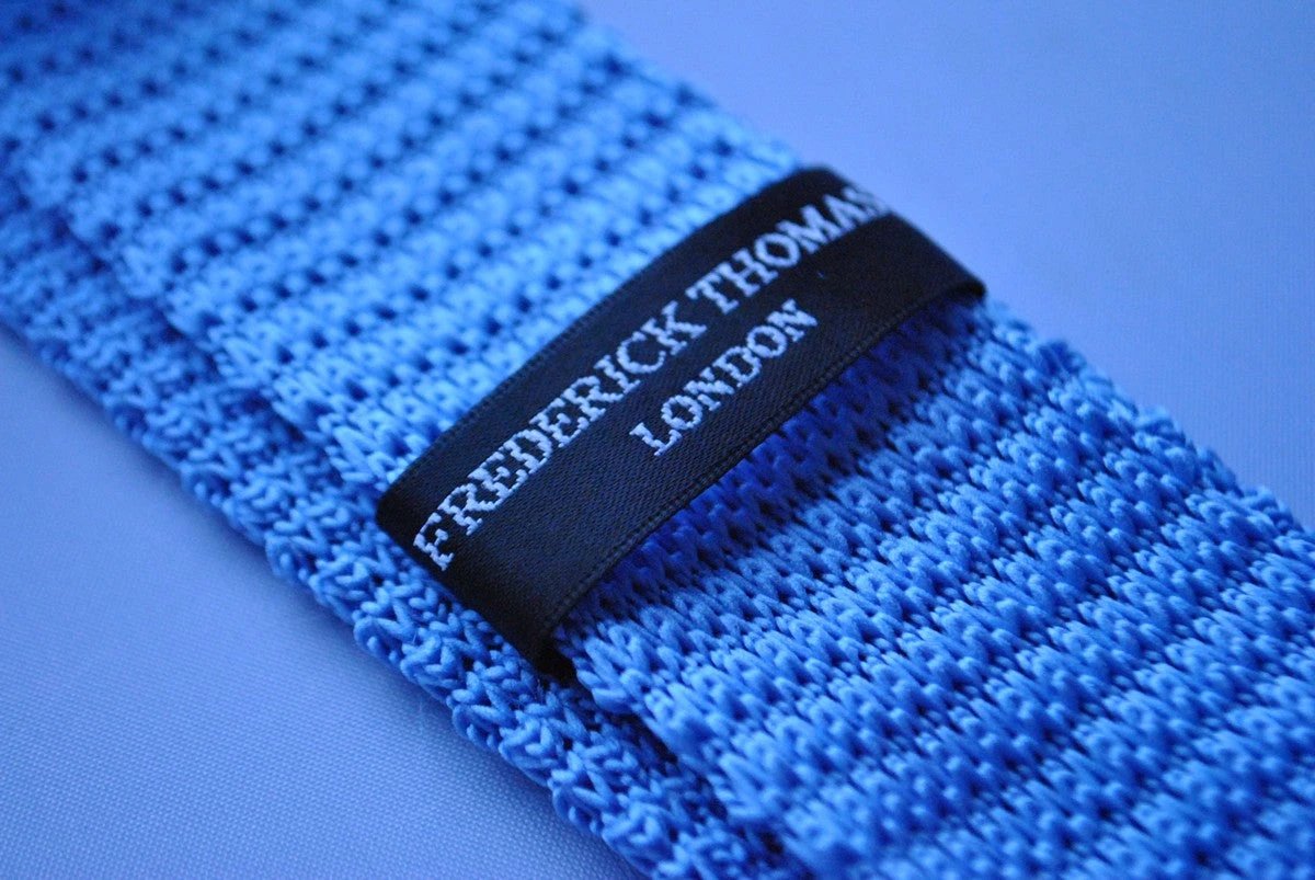 light blue skinny knitted tie with white polka dots by Frederick Thomas Handmade Mens Ties