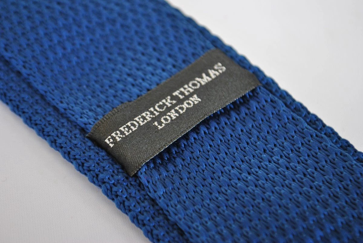 navy blue skinny knitted tie with pink polka dots with pointed end by Frederick Thomas Handmade Mens Ties