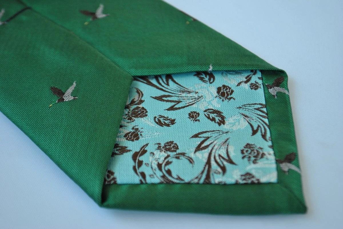 dark green tie with flying duck design by Frederick Thomas Handmade Mens Ties