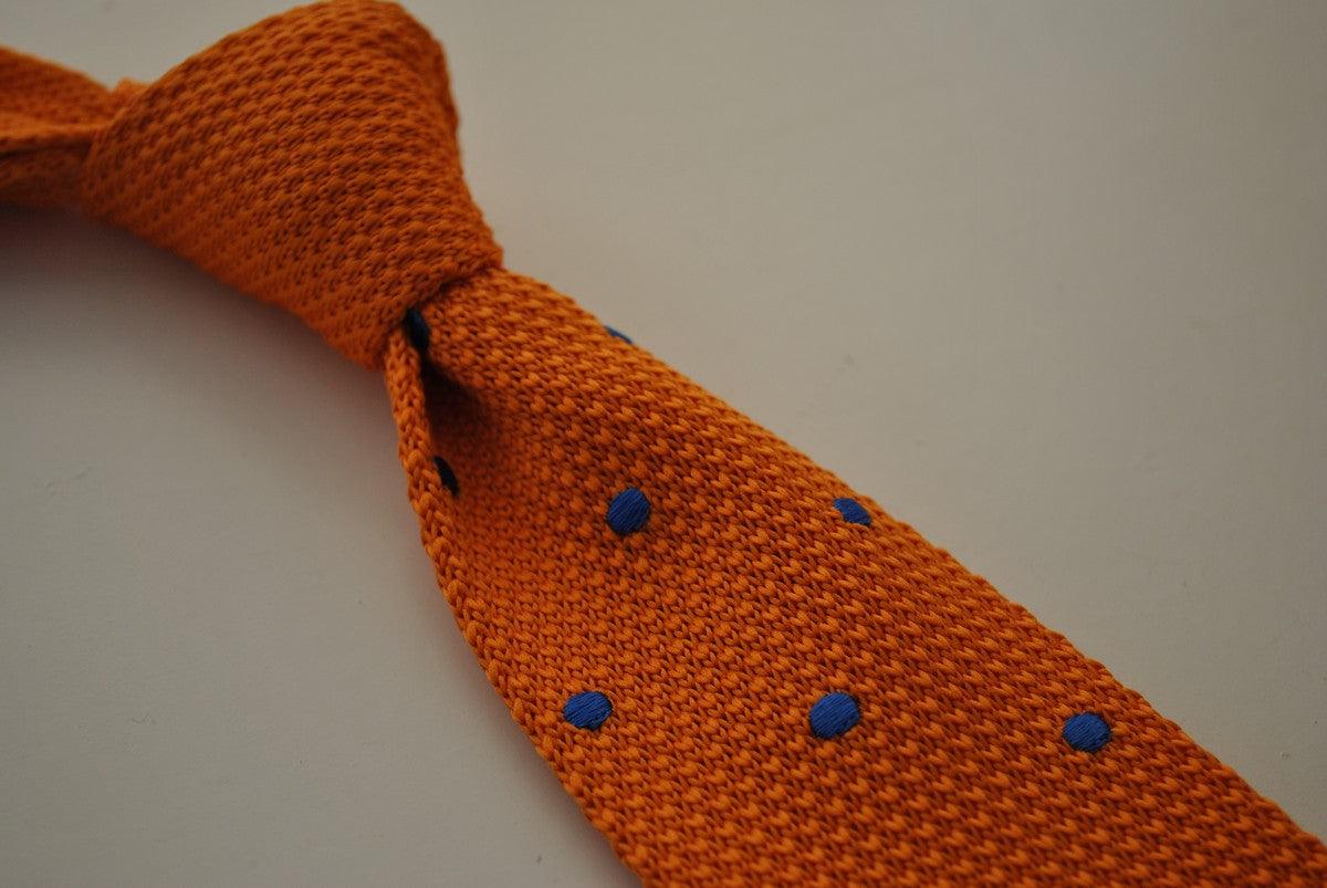 knitted orange tie with royal blue polka dots by Frederick Thomas Handmade Mens Ties