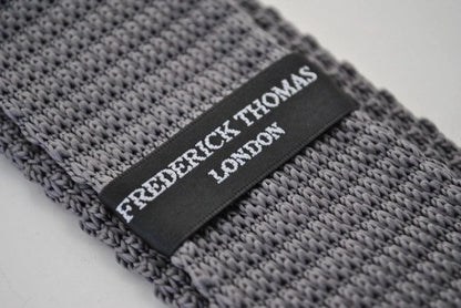 knitted silver grey tie with white polka dots by Frederick Thomas Handmade Mens Ties