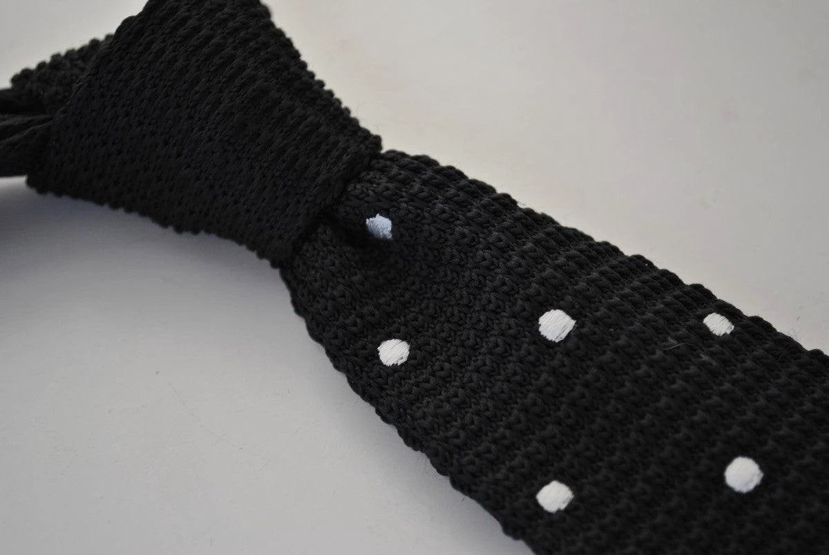 black skinny knitted tie with white polka dots by Frederick Thomas Handmade Mens Ties