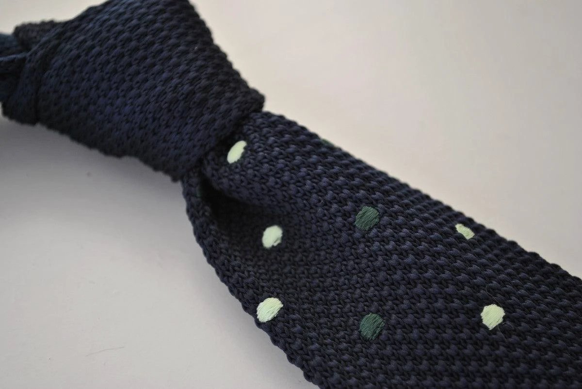 navy blue skinny knitted tie with green polka dots by Frederick Thomas Handmade Mens Ties