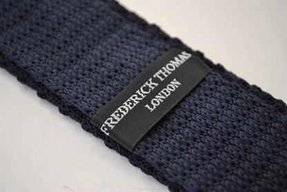 navy blue skinny knitted tie with brown polka dots by Frederick Thomas Handmade Mens Ties