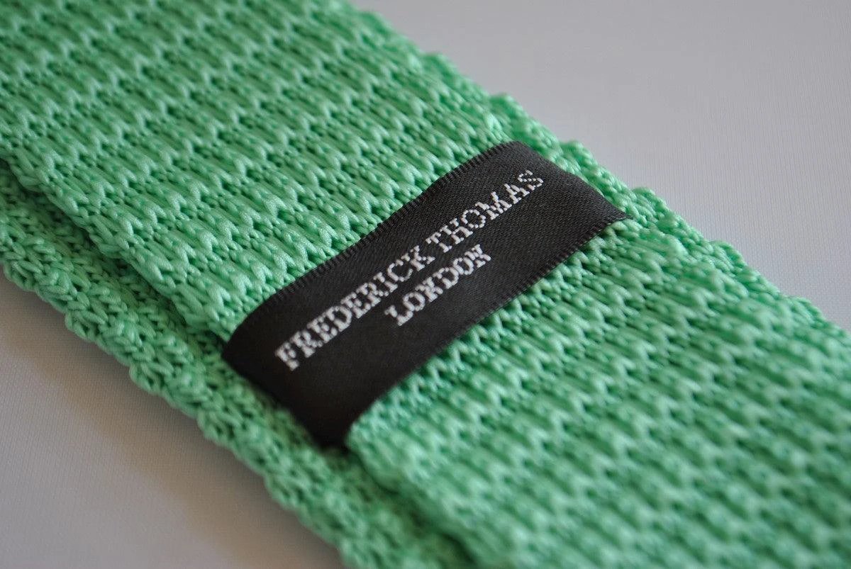 mint green skinny knitted tie with white tip by Frederick Thomas Handmade Mens Ties