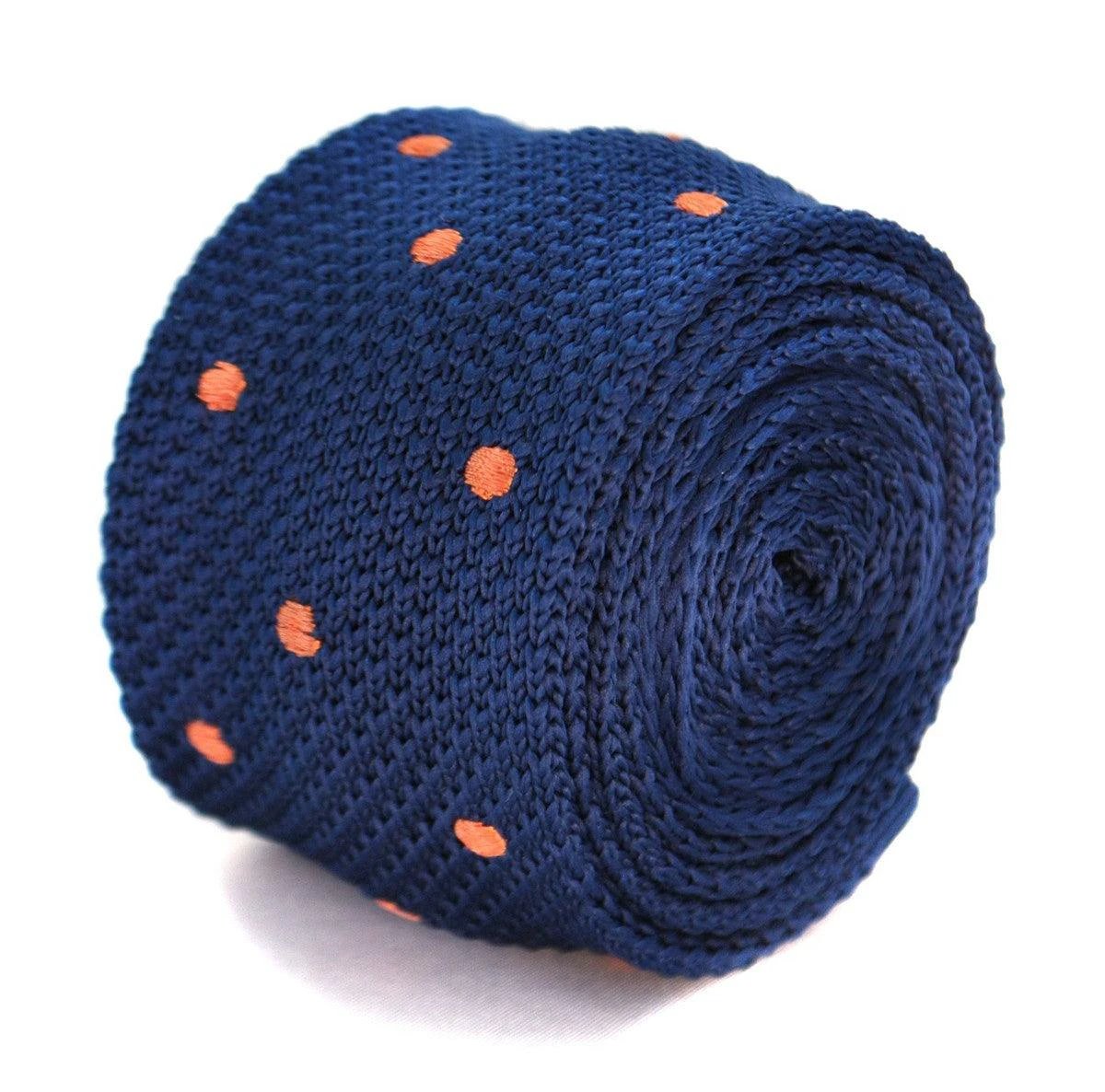navy blue skinny knitted tie with orange polka dots by Frederick Thomas Handmade Mens Ties