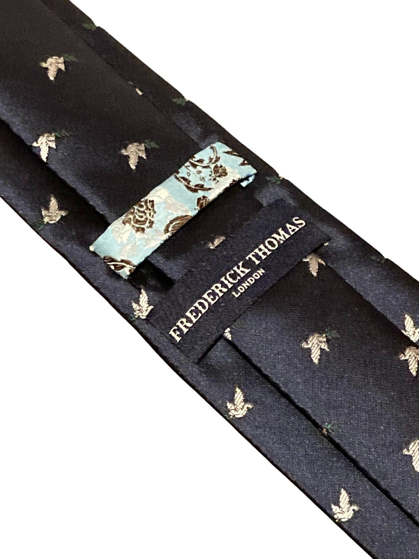 navy blue mens tie with white dove embroidered peace design by Frederick Thomas Handmade Mens Ties