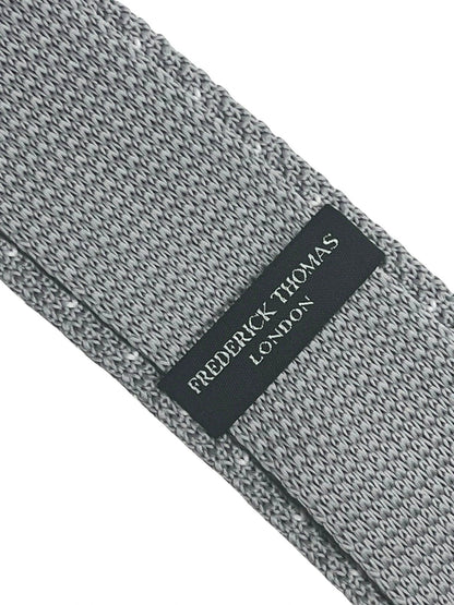Light silver grey knitted tie with white pin spots by Frederick Thomas Handmade Mens Ties