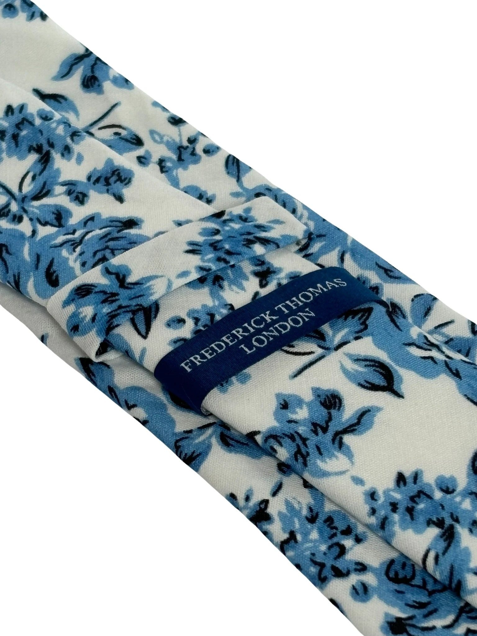 Ivory With Blue Rose Design Cotton Tie By Frederick Thomas - Handmade For Timeless Elegance And Contemporary Finish by Frederick Thomas Handmade Mens Ties