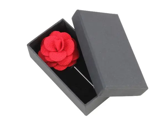 Boutonniere In Red Silk by Benson & Clegg