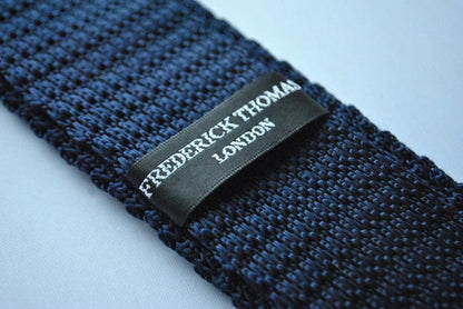 navy blue skinny knitted tie with multicoloured polka dots by Frederick Thomas Handmade Mens Ties