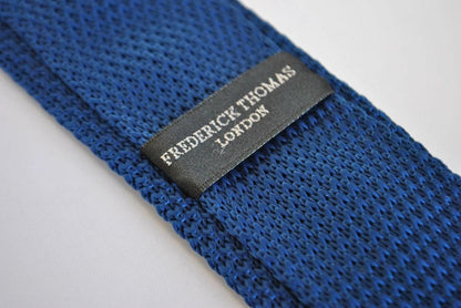 navy blue skinny knitted tie with brown polka dots by Frederick Thomas Handmade Mens Ties