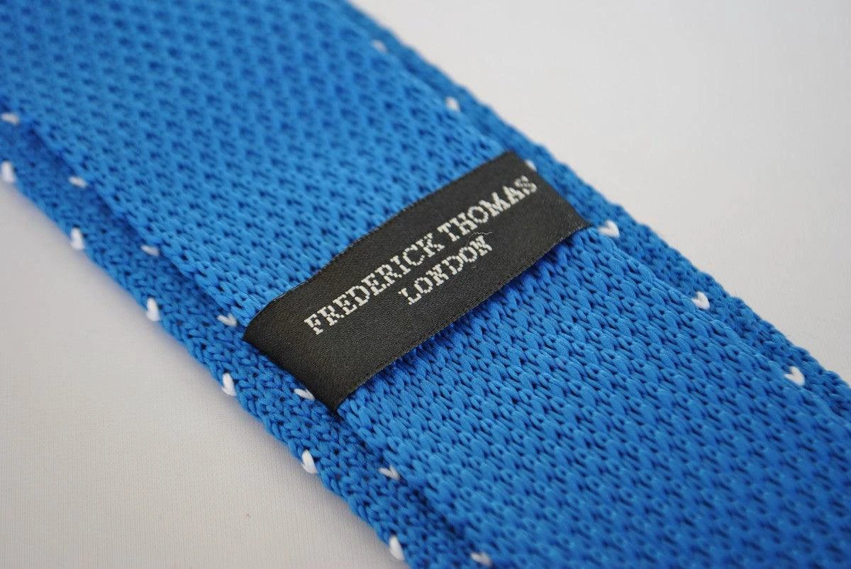 bright royal blue skinny knitted tie with white polka dots by Frederick Thomas Handmade Mens Ties