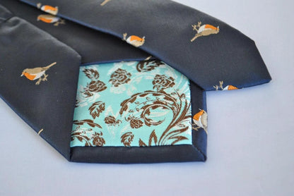 navy tie with embroidered robin design by Frederick Thomas Handmade Mens Ties