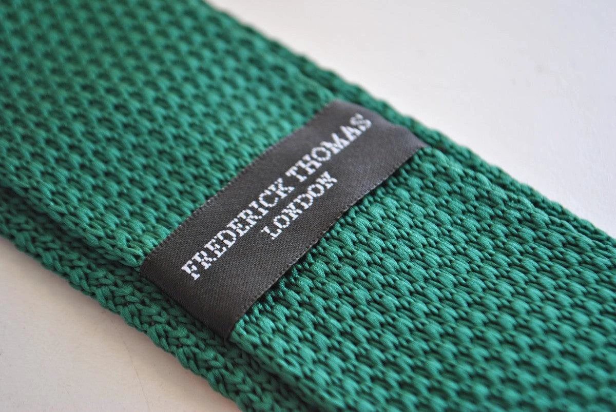dark green skinny knitted tie with red polka dots by Frederick Thomas Handmade Mens Ties