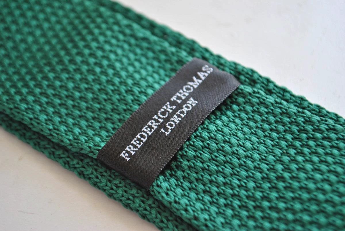 emerald green skinny knitted tie with white polka dots by Frederick Thomas Handmade Mens Ties