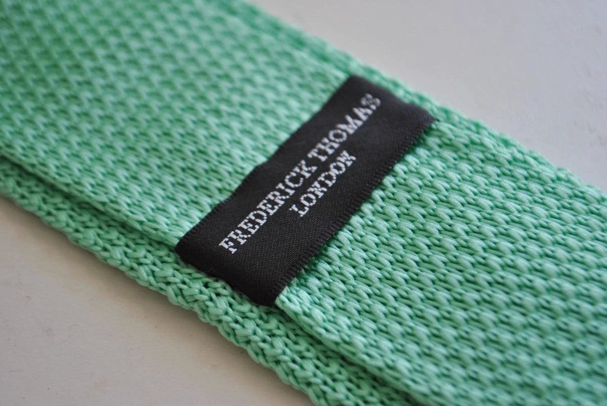 mint green skinny knitted tie with white polka dots by Frederick Thomas Handmade Mens Ties