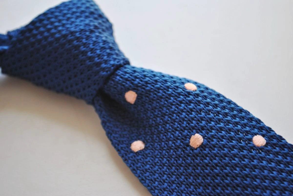 navy blue skinny knitted tie with powder pink polka dots by Frederick Thomas Handmade Mens Ties