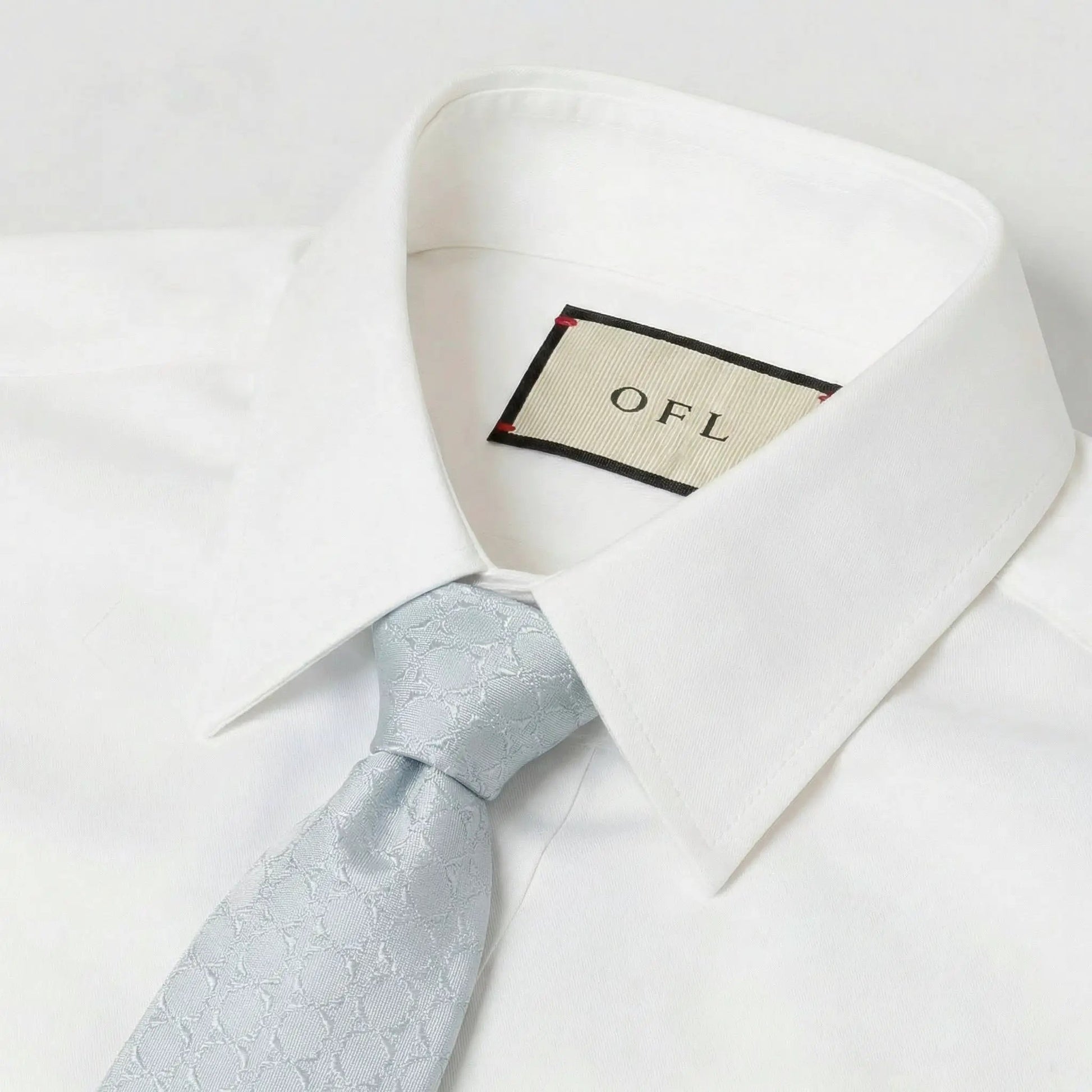 Light Blue Textured Tie by OFL Ties