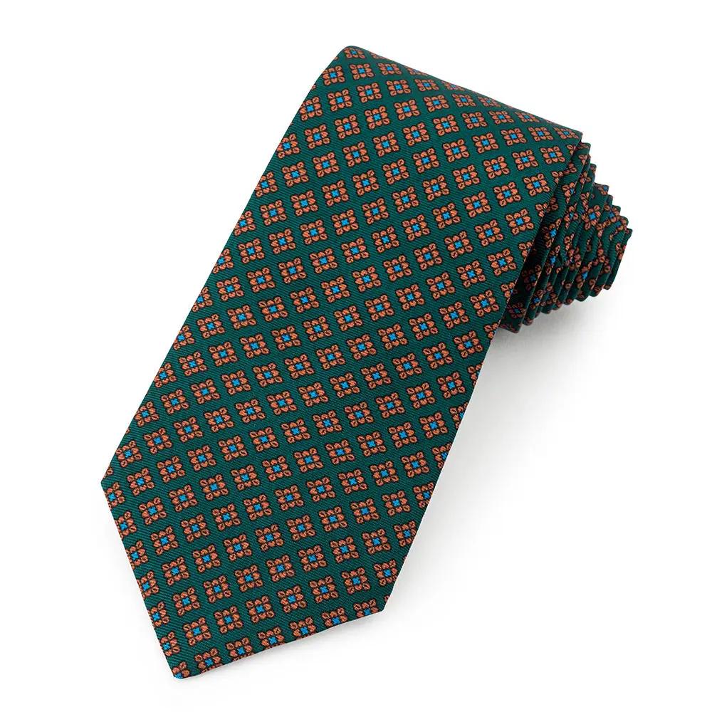 Floral Ancient Madder Silk Tie In Green by Benson & Clegg