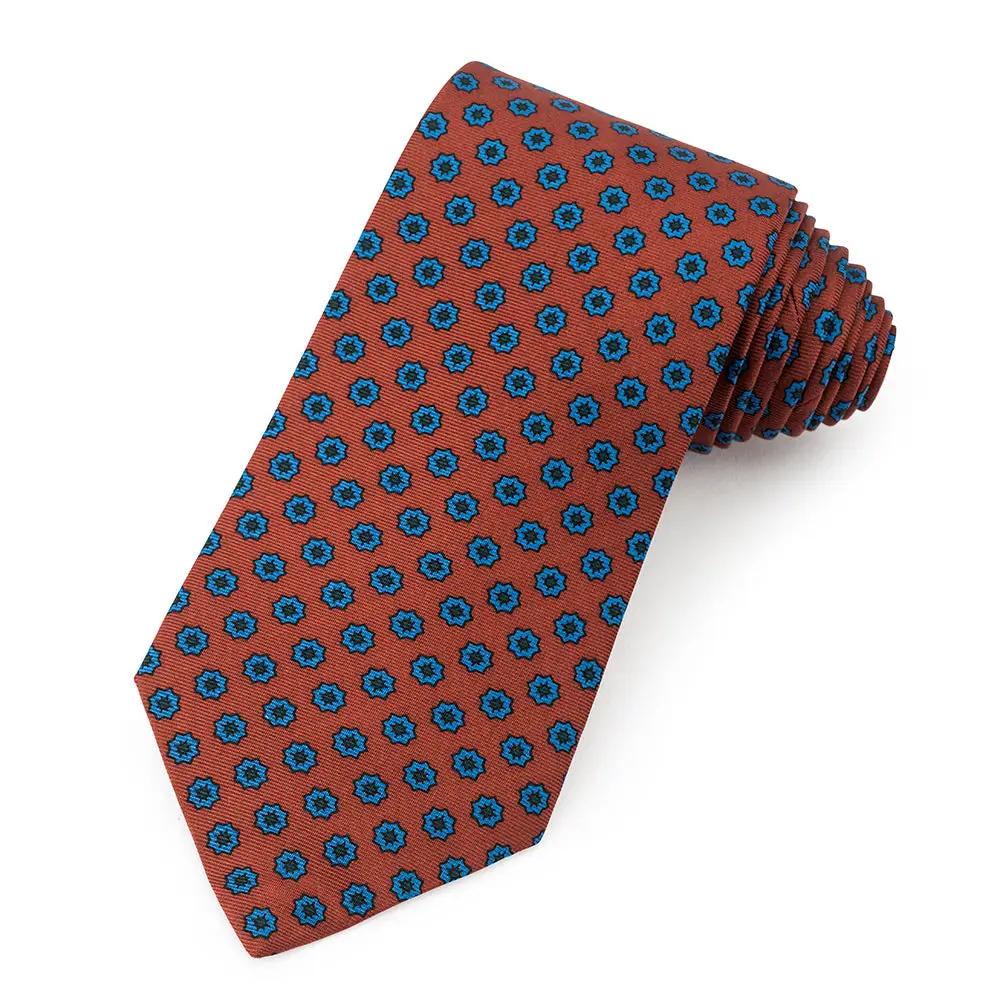 Star Ancient Madder Silk Tie In Brown by Benson & Clegg